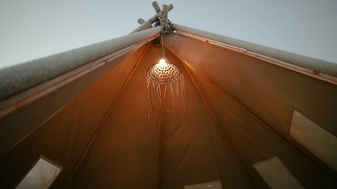 footage of inside of a tepee tent