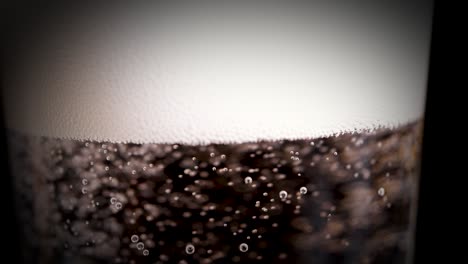 close-up of a glass of carbonated drink