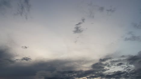 celestial-journey-as-the-heavens-unfold-in-this-captivating-time-lapse-video-featuring-clouds-drifting-across-a-backdrop-of-twinkling-star