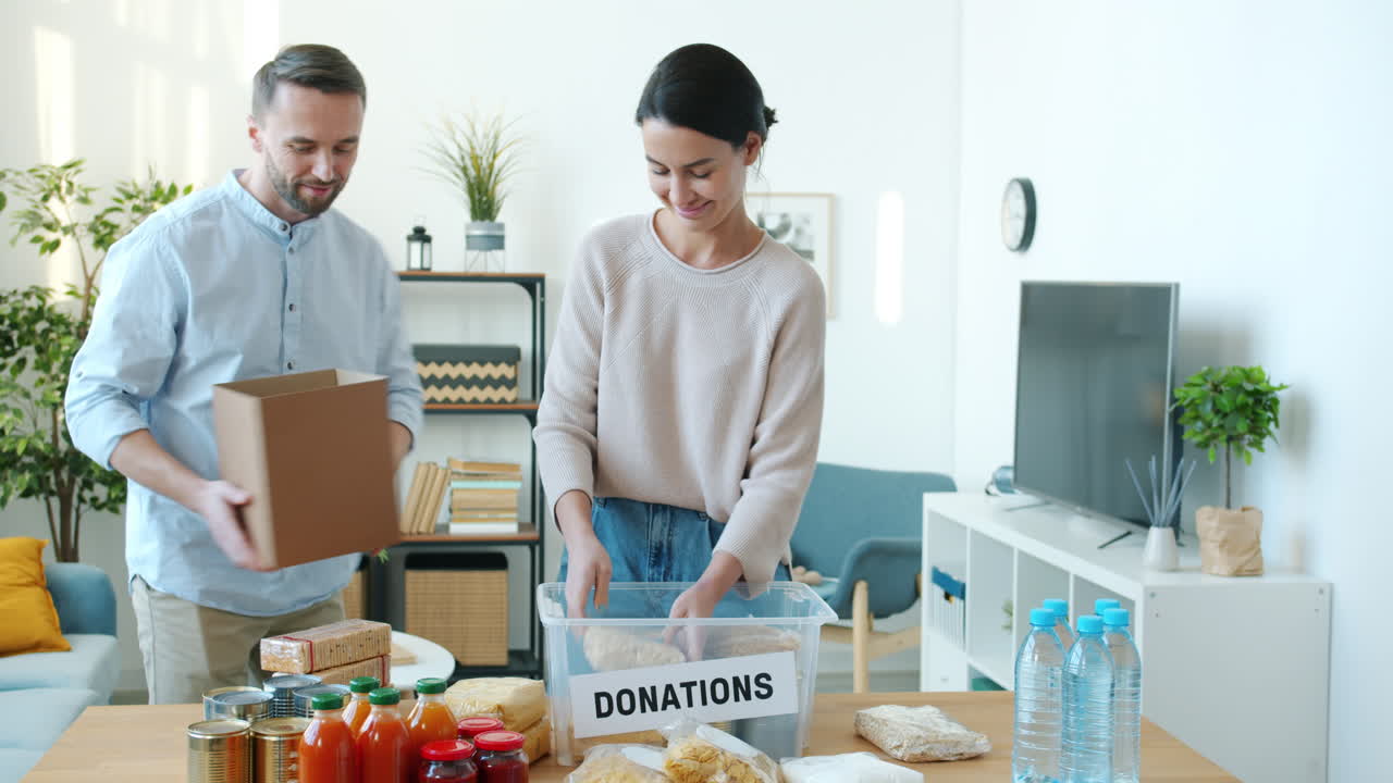 Couple Donating Food