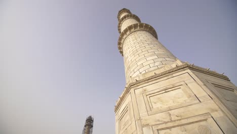 panning around a minaret of the taj mahal