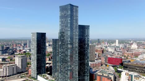 zooming out shot of deans gate square manchester city center shot with a drone