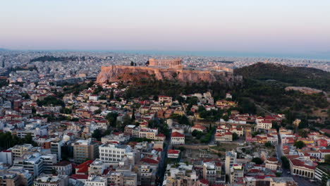 sunrise over parthenon, acropolis of athens, greece - aerial drone shot