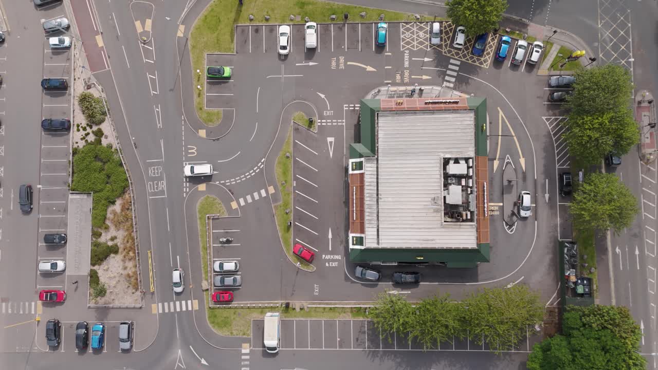 Aerial view of a McDonald's restaurant with drive-thru and parking lot