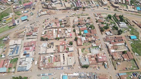 Busy-African-market-in-tribal-village-of-Loitokitok,-traditional-rural-community,-aerial-view