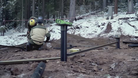 construction work in a snowy forest