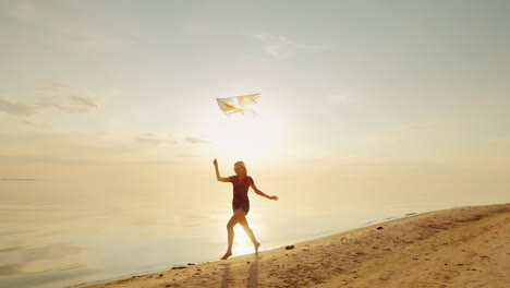 Happy-Young-Woman-Running-With-A-Kite-Concept---Cloudless-Prospects-Confidence-And-Carelessness