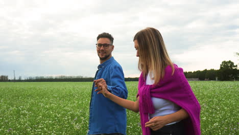 couple walking in the field