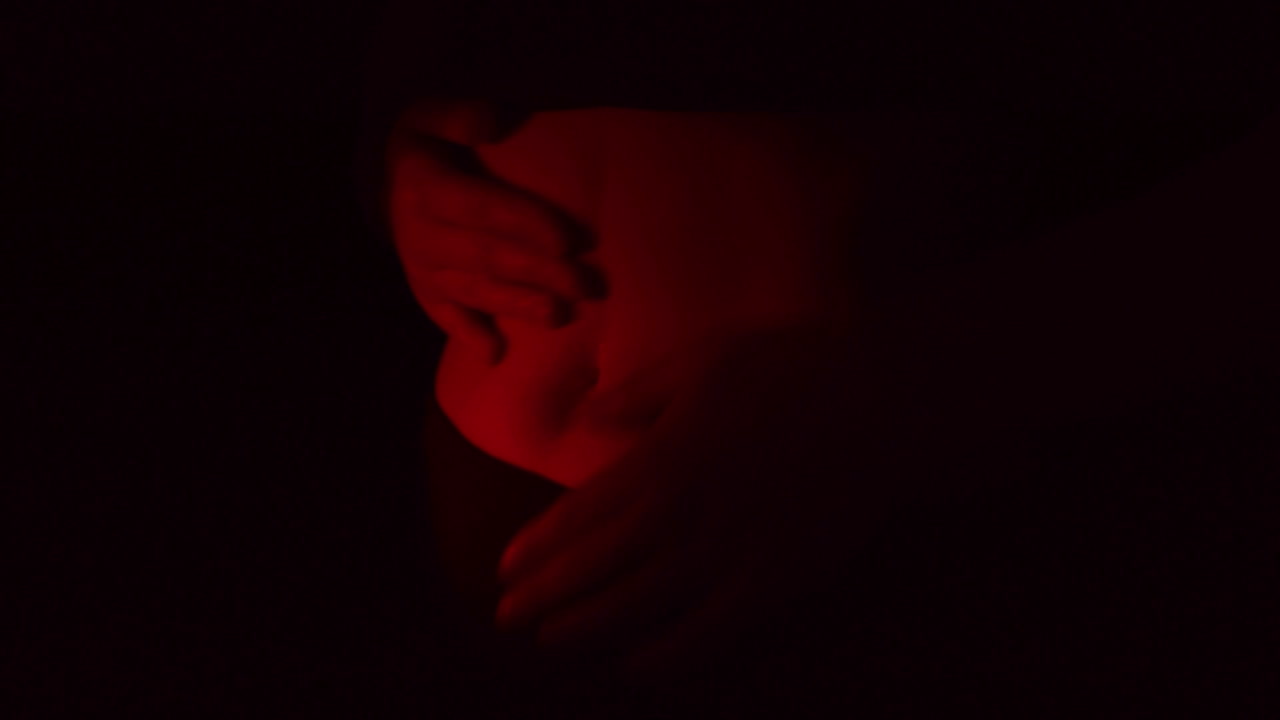 Woman massaging her belly. Menstruation pain concept