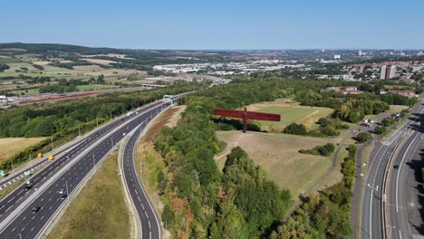 drone aerial view of the angel of the north sculpture in gateshead, north east england