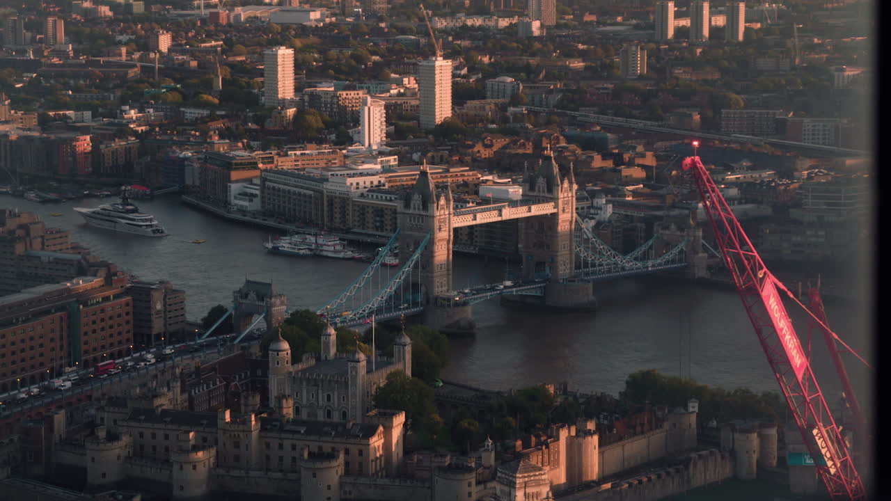Tower bridge seen through a window at dusk