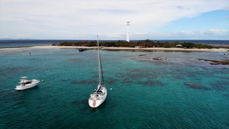 sailing boat new caledonia amedee pacific paradise costal sea drone 4k