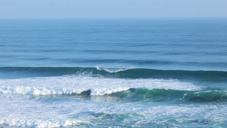 ocean waves breaking on the shore