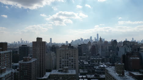 a cinematic rise shot capturing the grandeur of the new york city skyline, unfolding seamlessly from the lively midtown to the dynamic downtown district