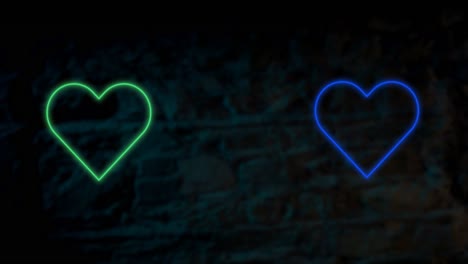 Animation-of-green-and-blue-neon-hearts-flashing-on-dark-brick-wall-background