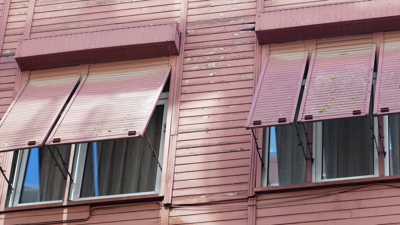 Pink Building with Vintage Shutters