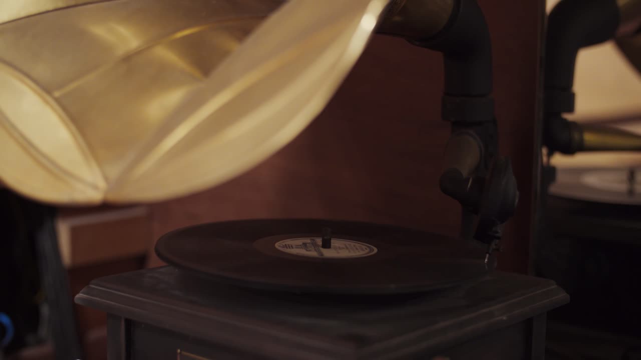 Old and vintaje turntable with a golden cone - Professional recording studio - 4K at 60fps (slowmotion) - Professional audio vives
