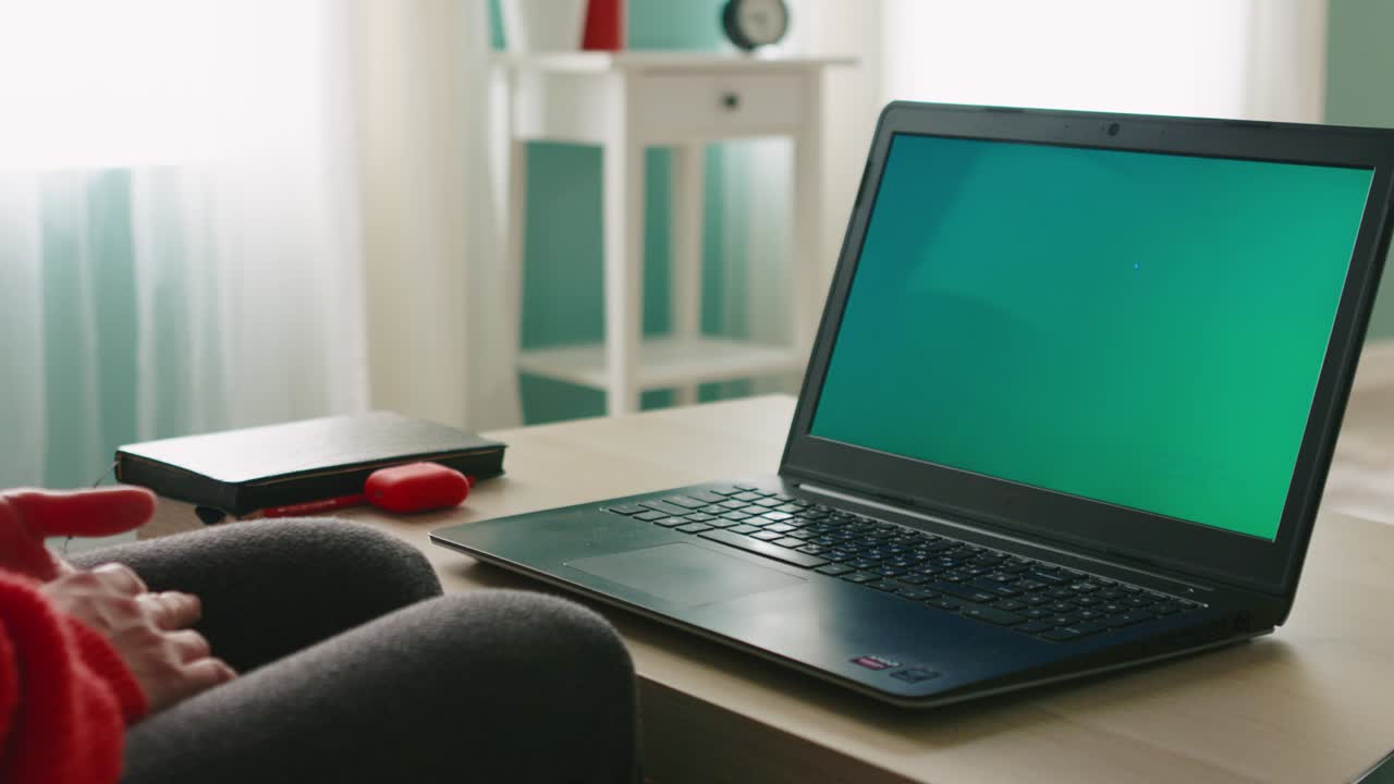 Young Woman Calls to Friends Using Laptop