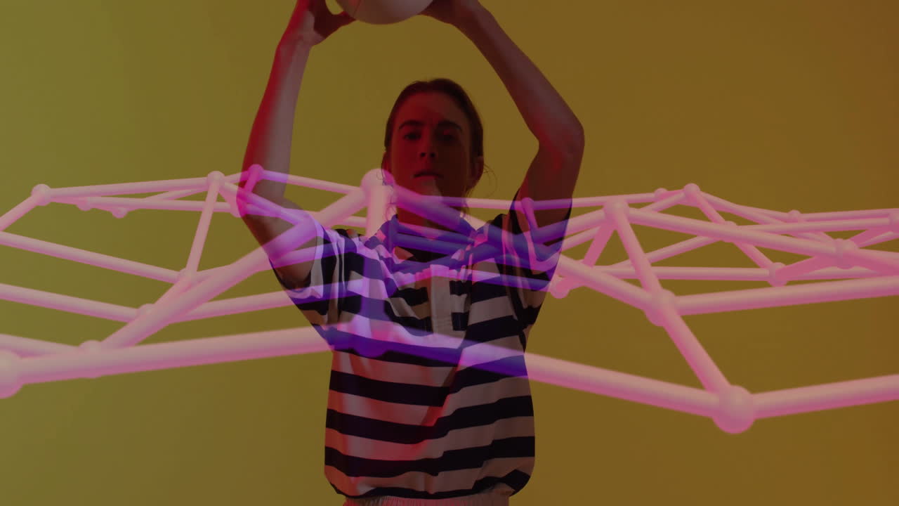 Person playing volleyball with geometric animation overlay on yellow background