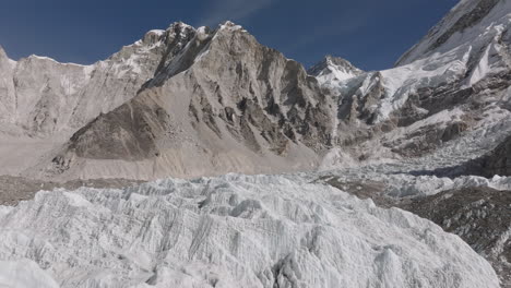 Drone-shot-of-Khumbu-Glacier-and-surrounding-mountains-in-Everest-Base-Camp,-Nepal