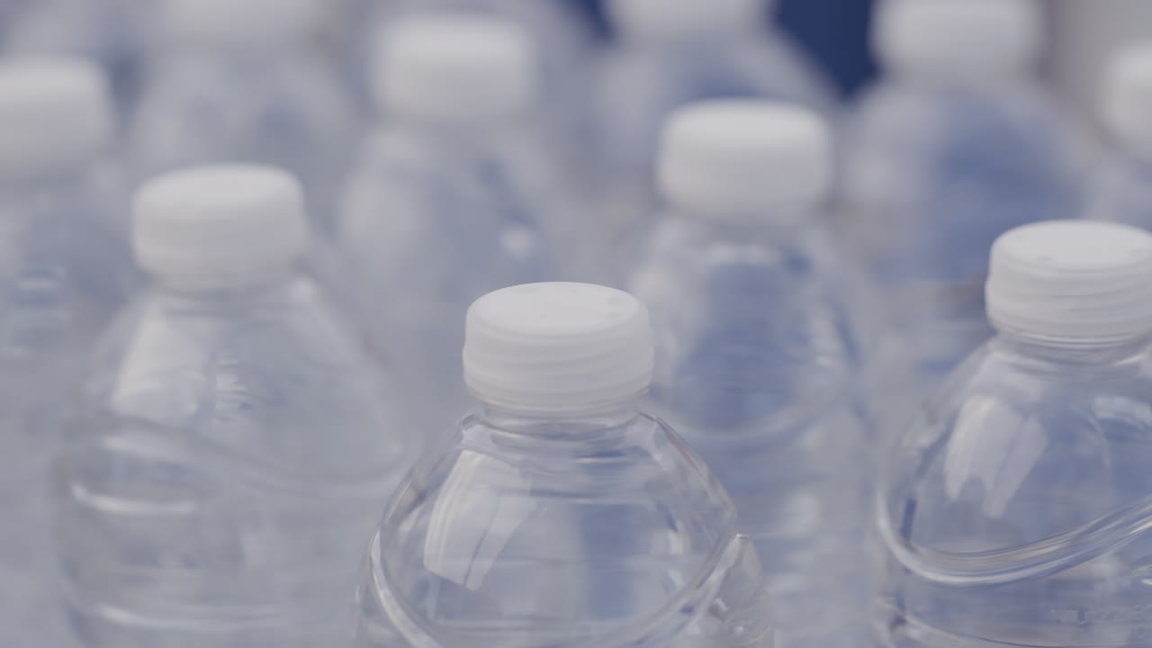 Close-up shot of a group of water bottles at a food bank.
