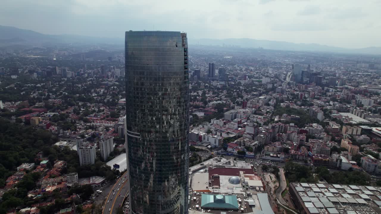 Aerial View Of Centro Comercial Mítikah In Benito Juárez Borough. Slow Dolly Left