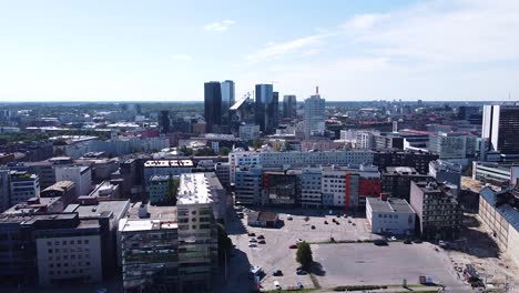 Skyline-of-Tallinn-city-with-apartment-buildings-and-skyscrapers,-aerial-view