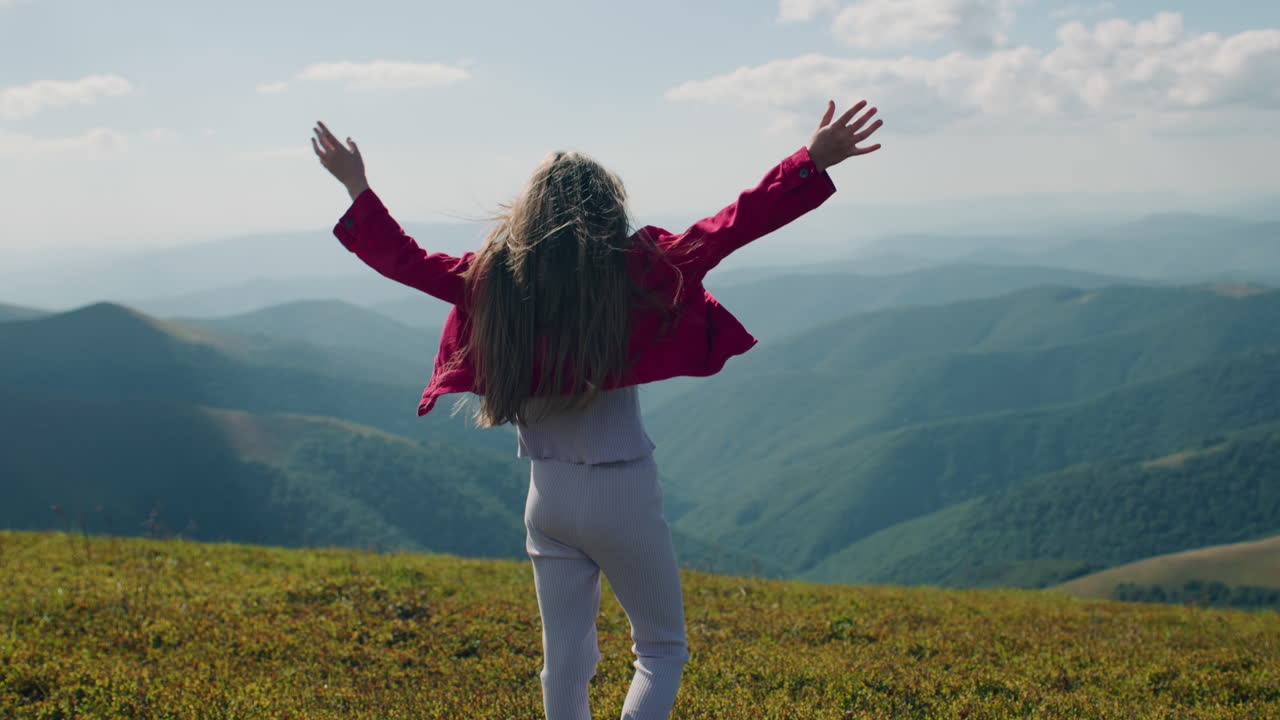Girl enjoying mountain view