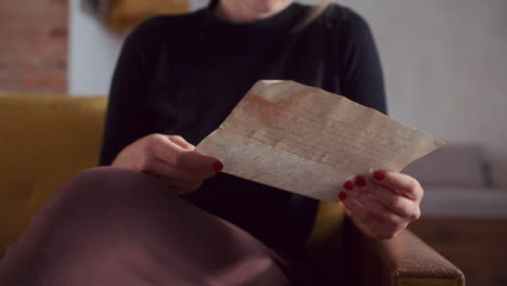 woman reading a vintage letter