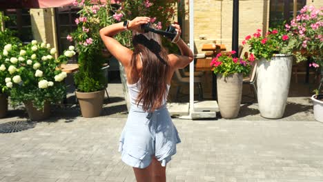 woman enjoying a summer day at a cafe