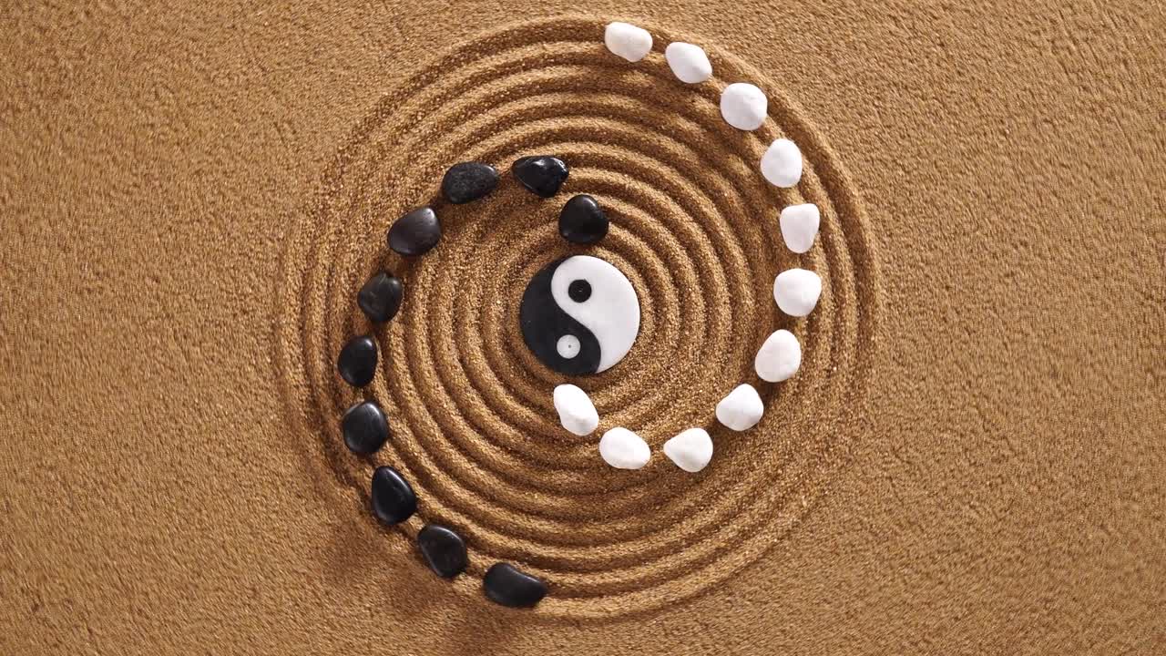 Japanese ZEN garden with yin yang stones in textured sand