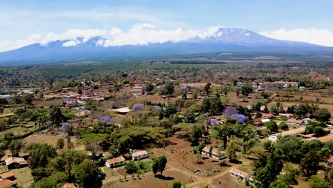 rural village town of kenya with kilimanjaro in the background