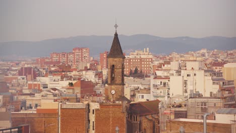 les corts de sarrià residential buildings and neighborhood under gray and hazy sky due to climate change, barcelona, spain