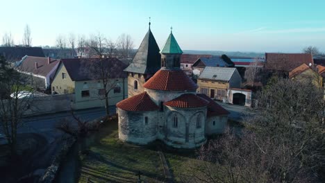 Flying-away-from-the-rotunda-of-the-Nativity-of-the-Virgin-Mary-in-a-czech-village-Holubice