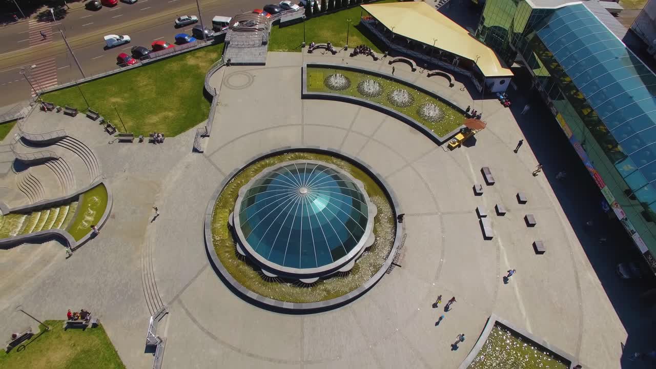 Building with a glass dome 01