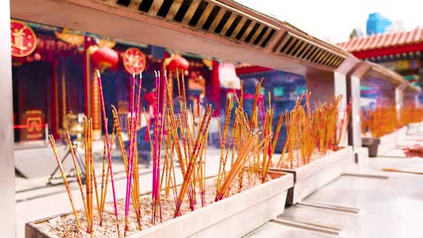 incense sticks burning in hong kong temple setting