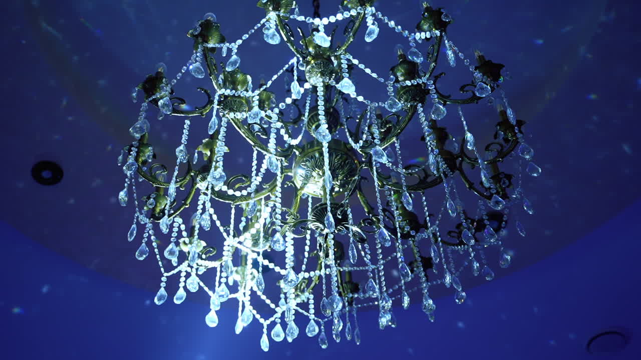 Beautiful crystal chandelier. Decorative elegant vintage and modern interior