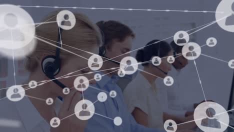 Animation-of-network-of-connections-with-icons-over-diverse-business-people-using-phone-headsets