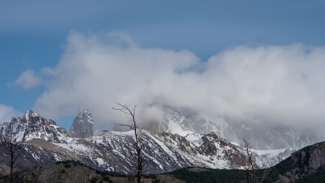 Cloud Waves Above Mountain Peak. Timelapse of Fitz Roy, Patagonia, Chile Argentina Border