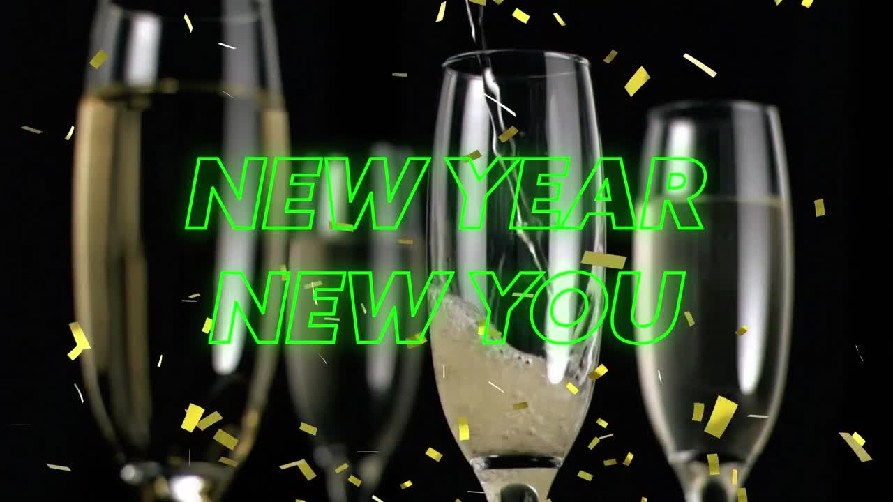 Animation of happy new year text over glasses of champagne and confetti