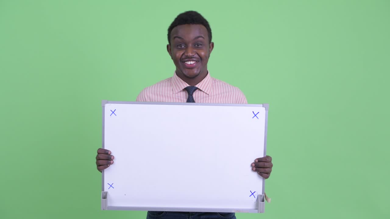 Young African businessman with Afro hair