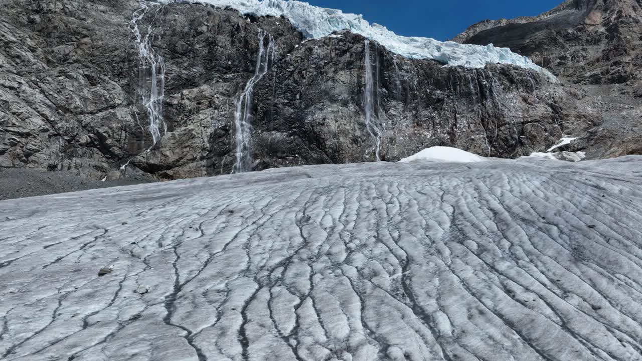 Aerial Forward Drone cruise Closeup Shot of Fellaria's Glacier and its Waterfalls - Valmalenco - Sondrio