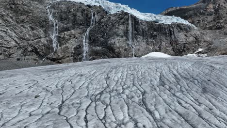 Aerial Forward Drone cruise Closeup Shot of Fellaria&#039;s Glacier and its Waterfalls - Valmalenco - Sondrio