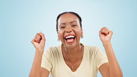 Woman,-excited-and-face-of-success-with-fist