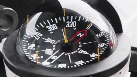 Close-Up-magnetic-Marine-Compass,-Nautical-Navigation-Instrument