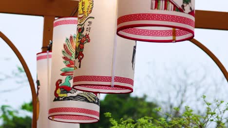 decorative lanterns gently swaying in the wind