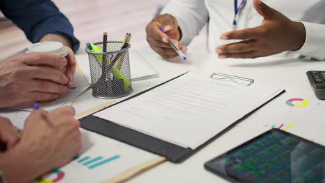 elderly people in a modern office setting meeting with financial advisor