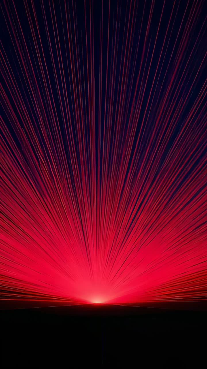 Vertical video: Expanding red point emitting thin vertical streaks over dark horizon, forming fan