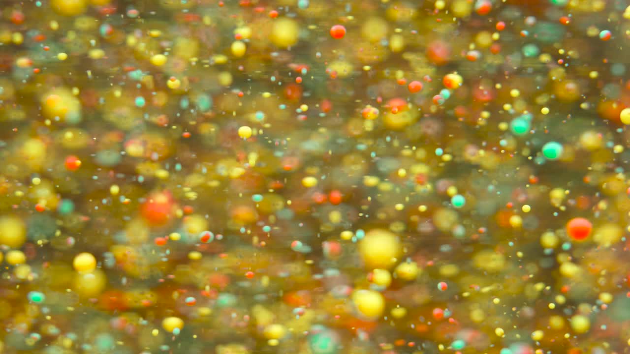 Slow Motion Bright Colors Bubbles Oil Beautiful Paint Universe Color Moving Multicolored Closeup. Acrylic Paint. Fantastic Surface. Abstract Colorful Paint Metamorphosis Structure Colorful Bubbles