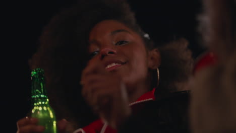 beautiful-young-african-american-woman-dancing-enjoying-rooftop-party-at-night-drinking-hanging-out-with-friends-on-weekend-celebration